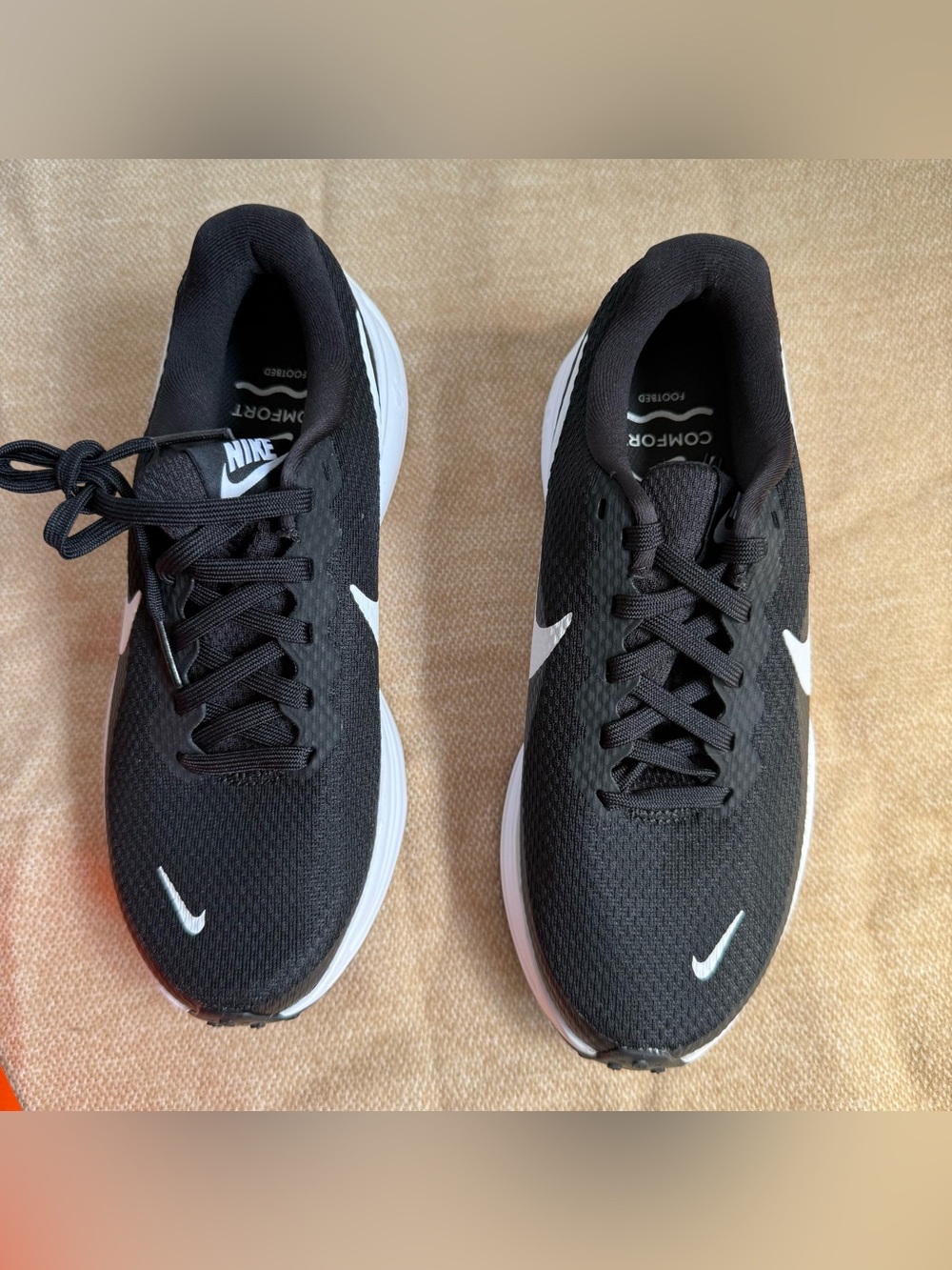 Size 6.5 US Women's- Nike Revolution 8
Black White.